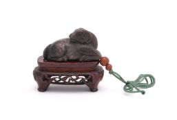 A small Chinese black jade carving of a ram