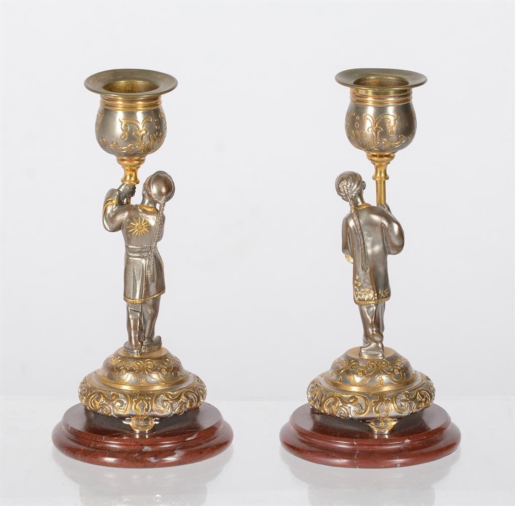 A PAIR OF FRENCH PARCEL GILT AND SILVERED FIGURAL CANDLESTICKS - Image 2 of 2