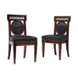 A SET OF FOUR CONTINENTAL MAHOGANY HALL CHAIRS