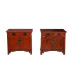 A PAIR OF RED LACQUERED CHINESE SIDE CABINETS