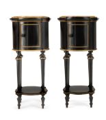 A PAIR OF FRENCH EBONISED AND GILT METAL MOUNTED BEDSIDE TABLES