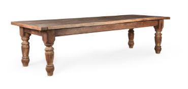 A STRIPPED ELM REFECTORY DINING TABLE
