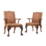 A PAIR OF MAHOGANY AND UPHOLSTERED ARMCHAIRS IN GEORGE III STYLE