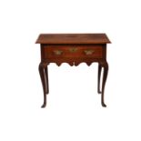 A GEORGE II OAK LOWBOY OR SIDE TABLE