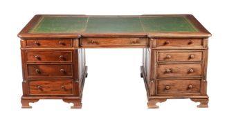 A MAHOGANY PEDESTAL DESK IN GEORGE IV STYLE