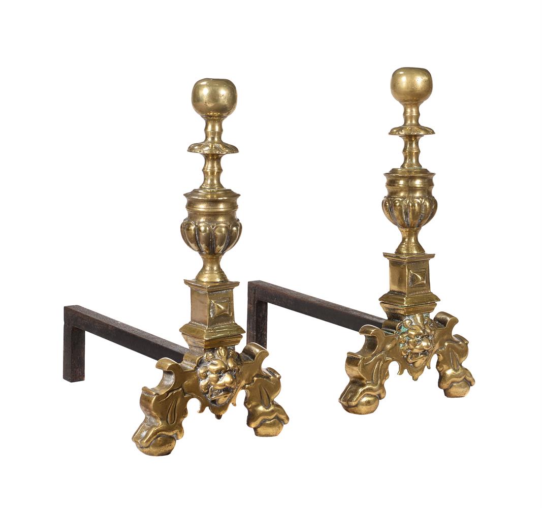 A PAIR OF BRASS AND CAST IRON ANDIRONS IN 18TH CENTURY TASTE
