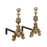 A PAIR OF BRASS AND CAST IRON ANDIRONS IN 18TH CENTURY TASTE