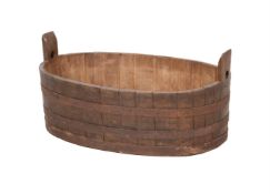 AN OAK AND METAL BOUND COOPERED OVAL BUCKET