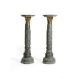 A PAIR OF GREEN MARBLE AND GILT METAL MOUNTED COLUMNS