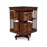 A WALNUT REVOLVING BOOKCASE