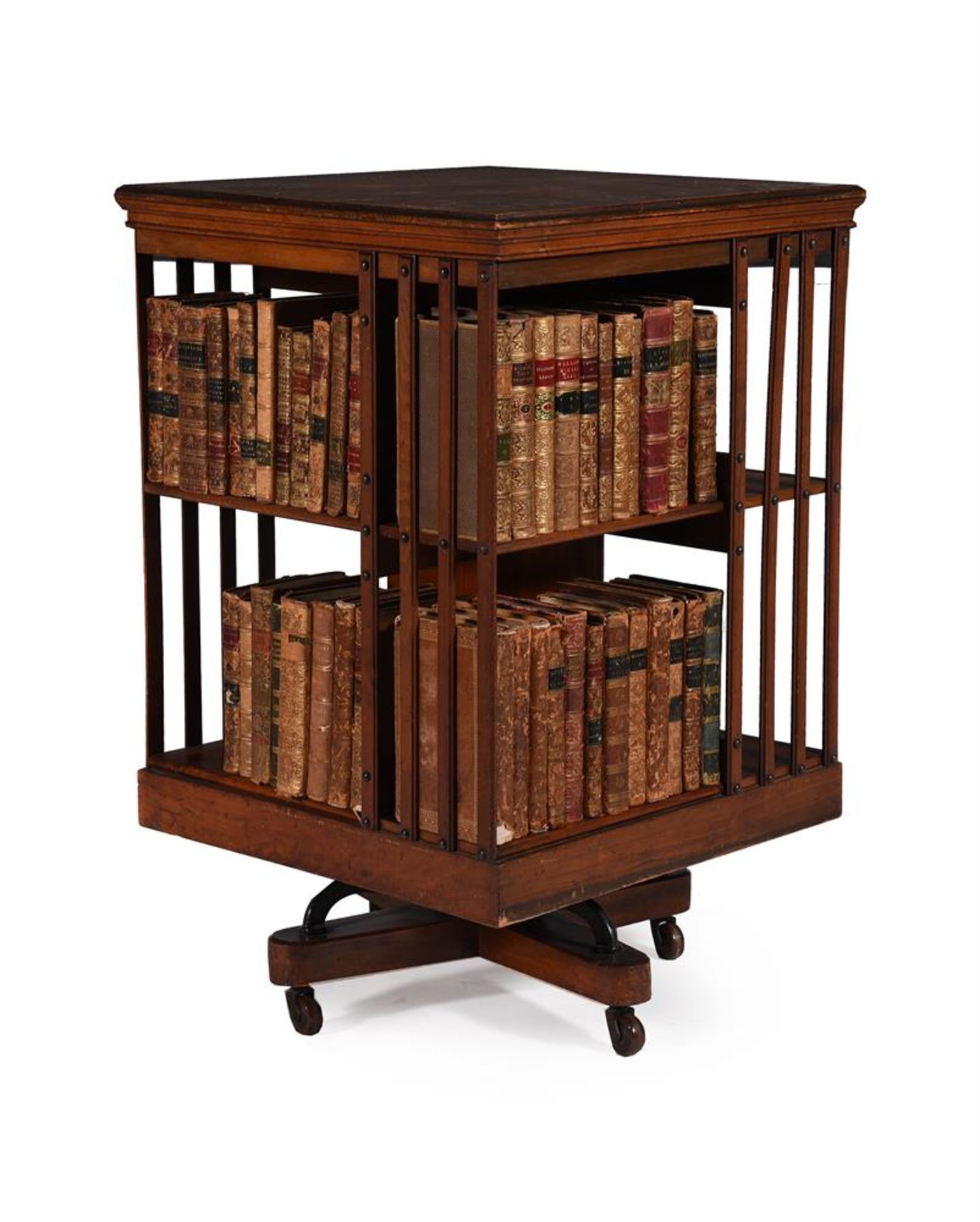 A WALNUT REVOLVING BOOKCASE