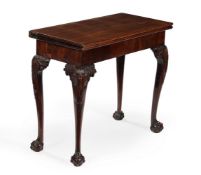 A GEORGE II MAHOGANY CONCERTINA ACTION FOLDING CARD TABLE, PROBABLY IRISH