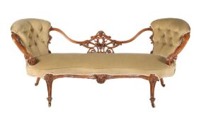 A VICTORIAN WALNUT AND UPHOLSTERED SOFA