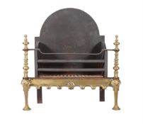 A BRASS AND CAST IRON FIRE BASKET IN BAROQUE TASTE