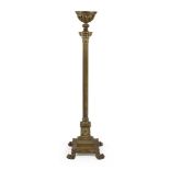 A BRASS STANDARD OIL LAMP IN NEOCLASSICAL TASTE