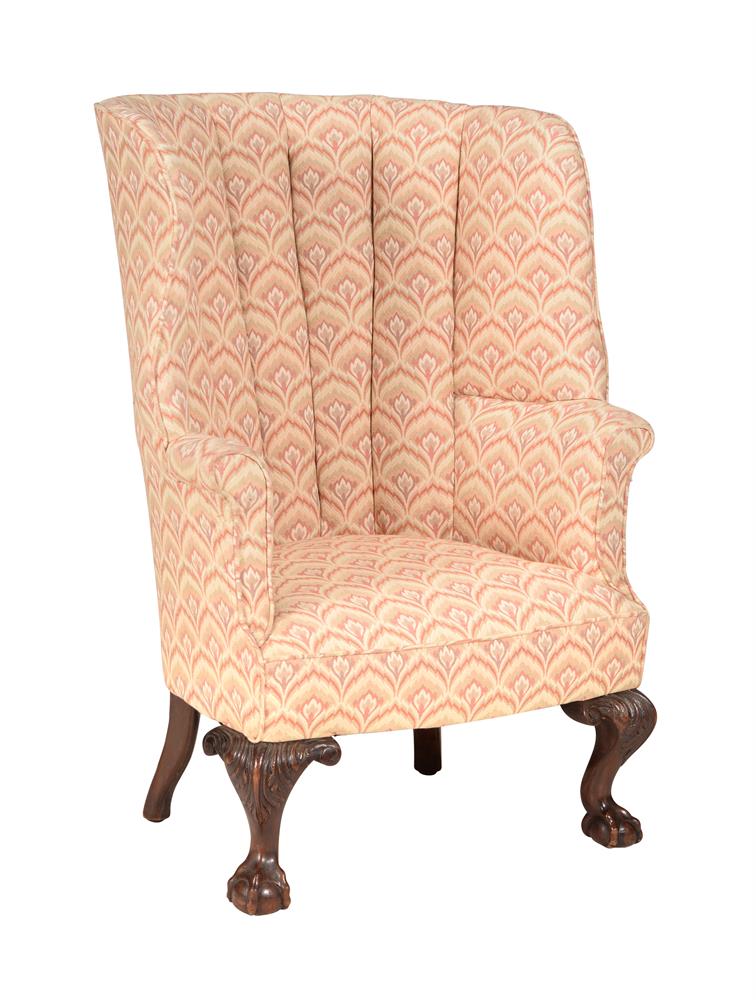 A MAHOGANY AND UPHOLSTERED BARREL BACK ARMCHAIR IN GEORGE III STYLE