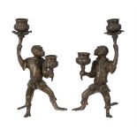 A PAIR OF BRONZE CANDLESTICKS