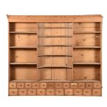 A STRIPPED PINE PLATE RACK