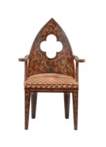 A PAINTED WOOD ARMCHAIR IN GOTHIC TASTE