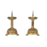 A PAIR OF FRENCH GILT METAL PRICKET CANDLESTICKS