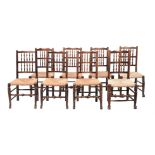 A HARLEQUIN SET OF ASH LADDER BACK DINING CHAIRS