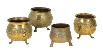 A GROUP OF FOUR VARIOUS BRASS JARDINIERES