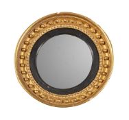 A GILTWOOD AND COMPOSITION CONVEX WALL MIRROR