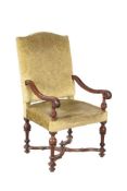 A WALNUT AND EBONISED OPEN ARMCHAIR IN LOUIS XIV STYLE