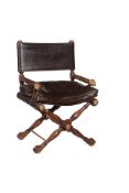 A MAHOGANY AND GILT METAL MOUNTED DESK CHAIR IN EMPIRE STYLE