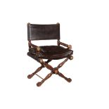 A MAHOGANY AND GILT METAL MOUNTED DESK CHAIR IN EMPIRE STYLE