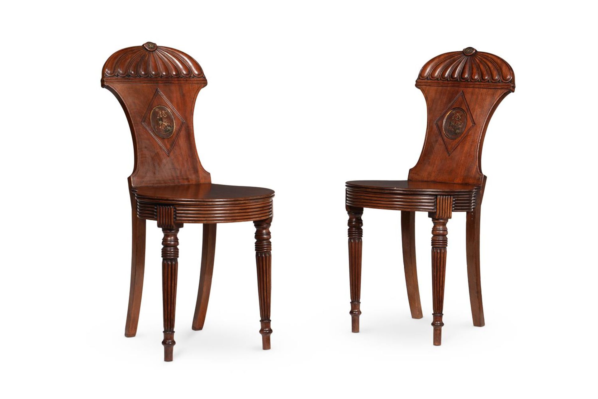 A PAIR OF REGENCY MAHOGANY HALL CHAIRS