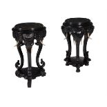 A PAIR OF EBONISED INDIAN TABLES