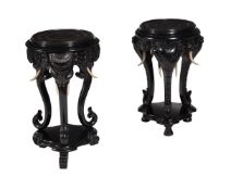 A PAIR OF EBONISED INDIAN TABLES