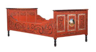 A RED AND POLYCHROME PAINTED SINGLE BED