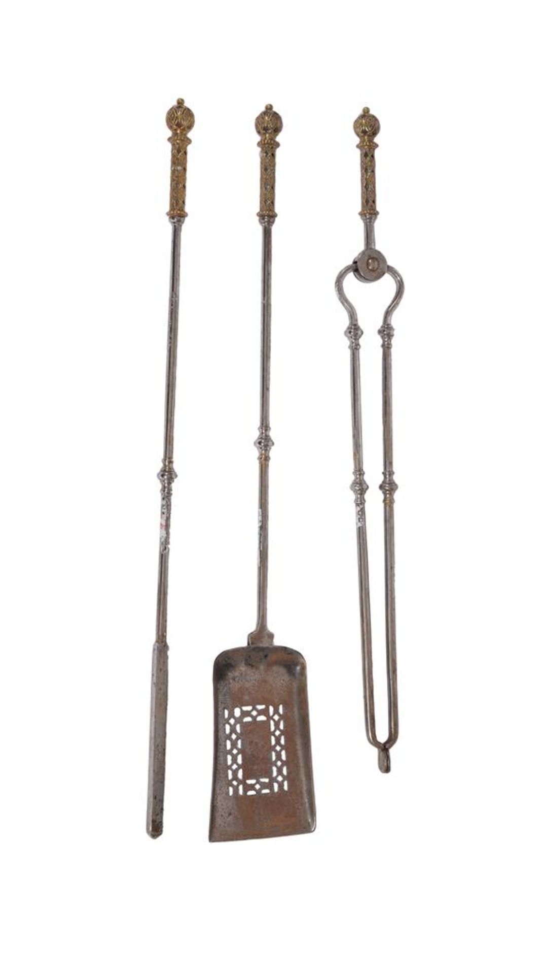 A SET OF THREE STEEL AND BRASS FIRE TOOLS