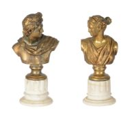 A PAIR OF FRENCH GILT METAL BUSTS OF APOLLO AND DIANA