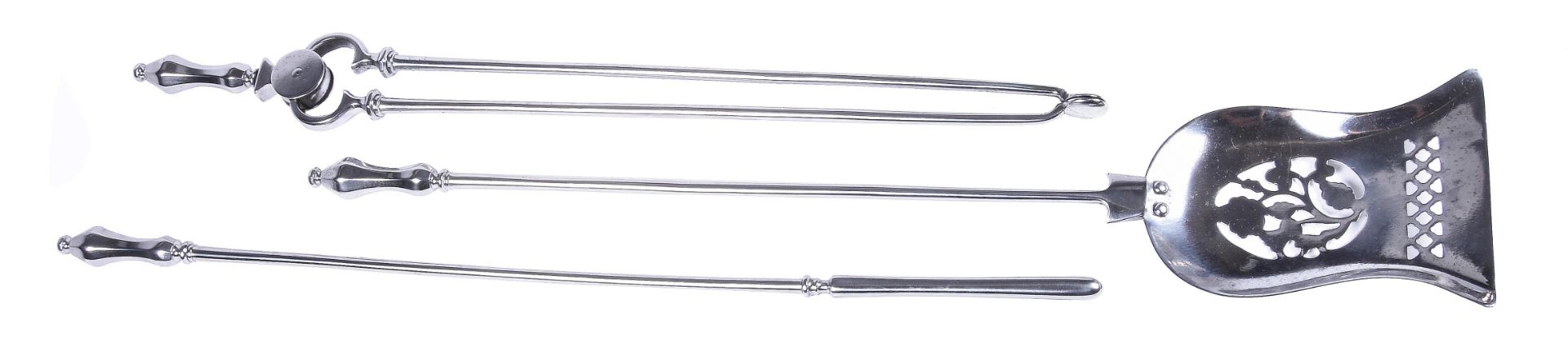 A SET OF POLISHED STEEL FIRE IRONS IN GEORGE III STYLE