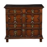 A CHARLES II OAK CHEST OF DRAWERS