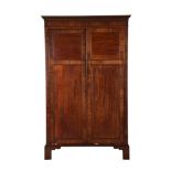 A GEORGE IV FIGURED MAHOGANY WARDROBE