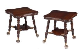 A PAIR OF STAINED HARDWOOD AND GILT METAL MOUNTED CENTRE TABLES IN THE STYLE OF CHARLES EASTLAKE