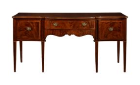 A GEORGE III MAHOGANY SERPENTINE FRONTED SIDEBOARD