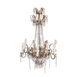 A CONTINENTAL SIX LIGHT GILT TOLE CHANDELIER