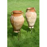 TWO SIMILAR TERRACOTTA AMPHORA ON STANDS