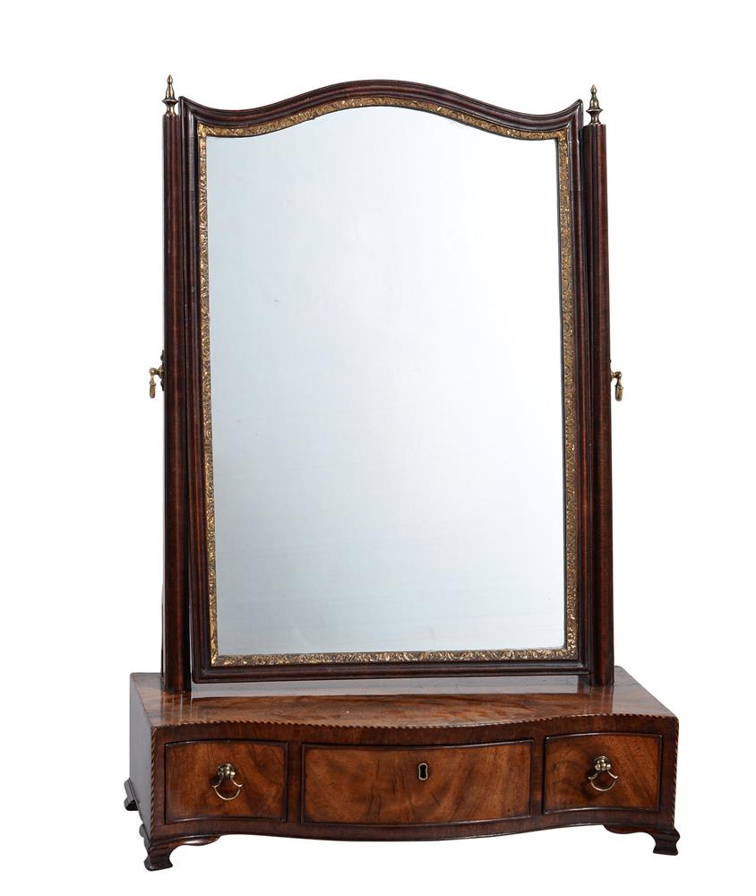 A GEORGE II MAHOGANY AND PARCEL GILT DRESSING TABLE MIRROR