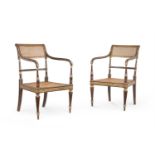 A PAIR OF GEORGE III SIMULATED ROSEWOOD AND PARCEL GILT ARMCHAIRS
