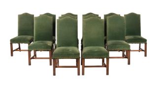 A SET OF TWELVE MAHOGANY AND GREEN VELVET UPHOLSTERED DINING CHAIRS