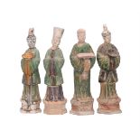 A GROUP OF FOUR SANCAI-GLAZED POTTERY FIGURES OF OFFICIALS IN TANG STYLE