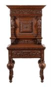 A FLEMISH OAK CABINET ON STAND