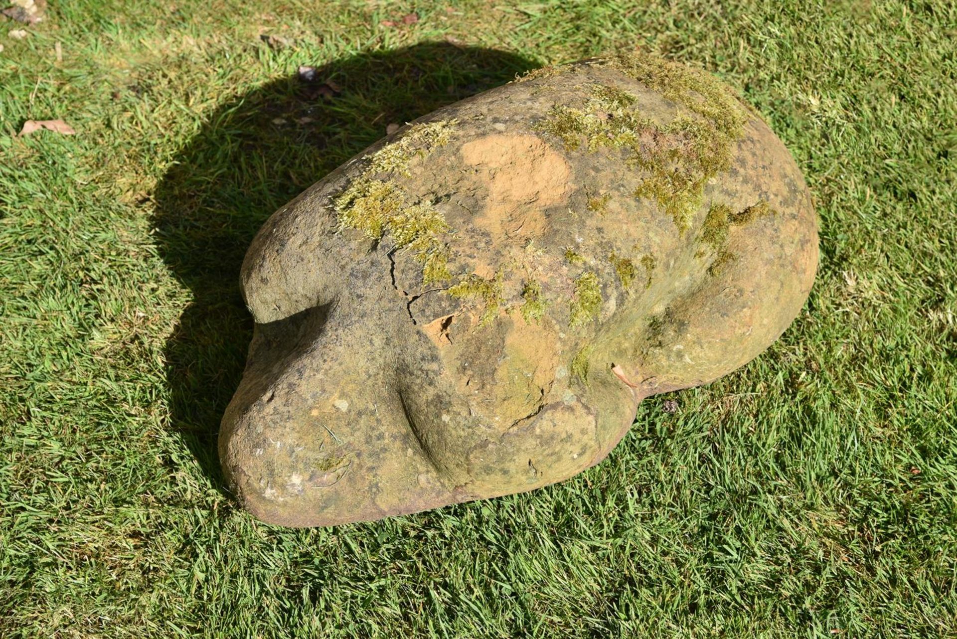 A SCULPTED SANDSTONE MODEL OF A TORSO