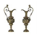 A PAIR OF BRASS EWERS IN RENAISSANCE REVIVAL TASTE